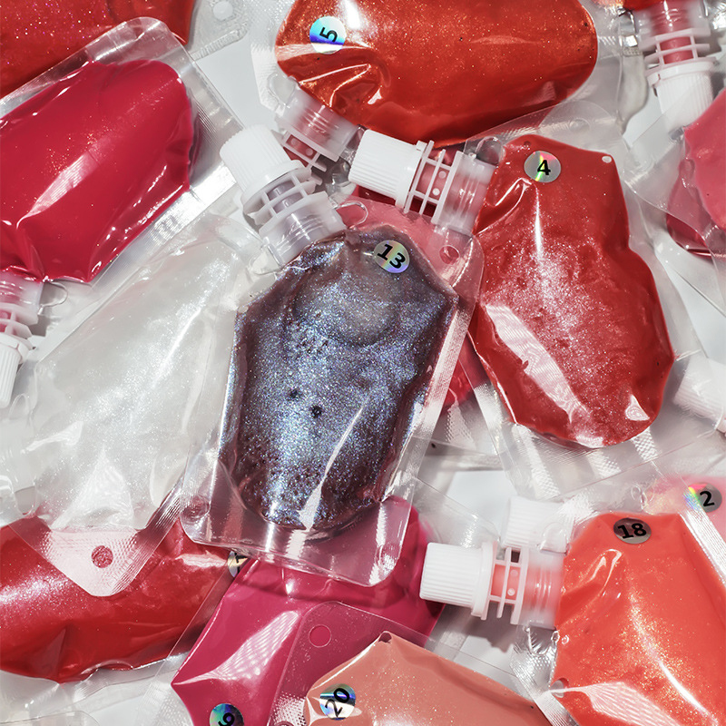 200 ml plastikpose Lipgloss mundstykkepose Vegansk og Cruelty Free Finished Lipgloss Base Pigment